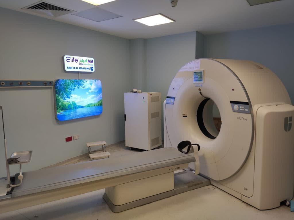 CT scanner imaging room with Elite branding